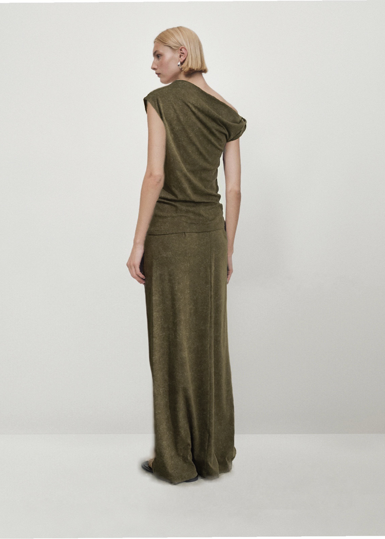 Asymmetrical Top in Moss