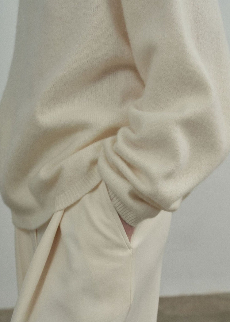 Wool Roll Neck Jumper in Cream