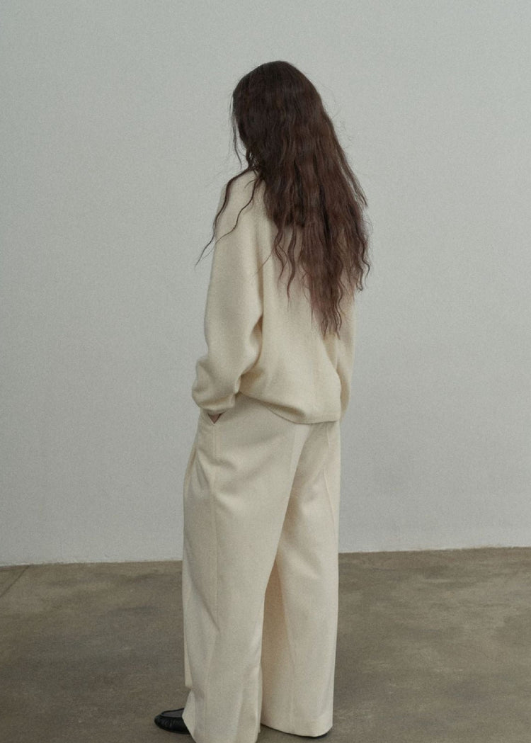 Wool Roll Neck Jumper in Cream