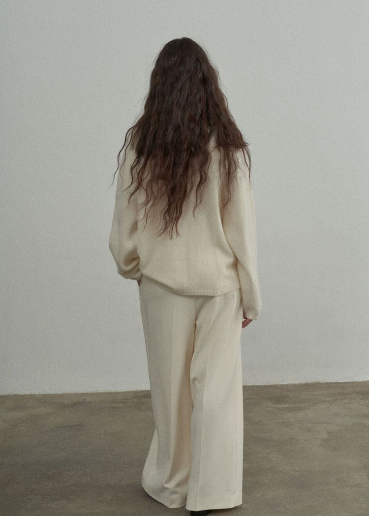 Wool Roll Neck Jumper in Cream